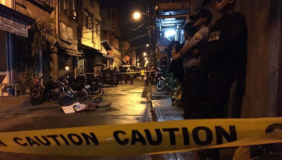 Filipino cops at a crime scene. Photo: Fernando Sepe Jr./ABS-CBN News