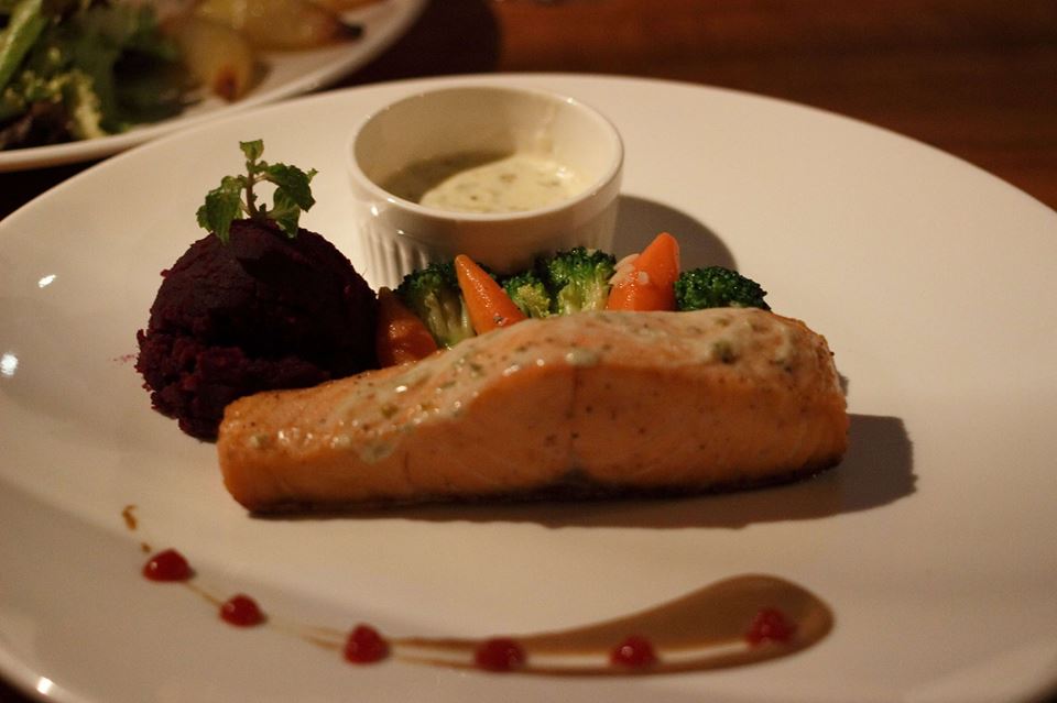 Fresh Salmon served with Sweet potato, Sauteed Vegetables, Capers creamy sauce | Nay Paing
