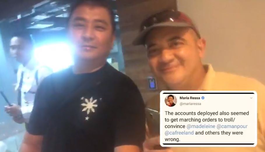 Duterte supporters Mark Lopez and Jovybev Aquino outside the office of Rappler in Pasig. Photo: Screenshot from Lopez’s video.