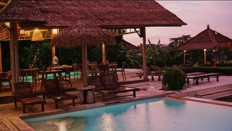 The dining area, sandwiched between two pools. Photo: Coconuts Bali