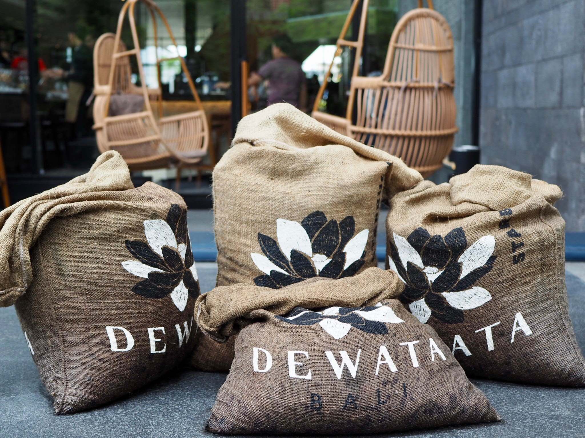 Rustic-look burlap coffee sacks are scattered around the entrance. Photo: Coconuts Bali