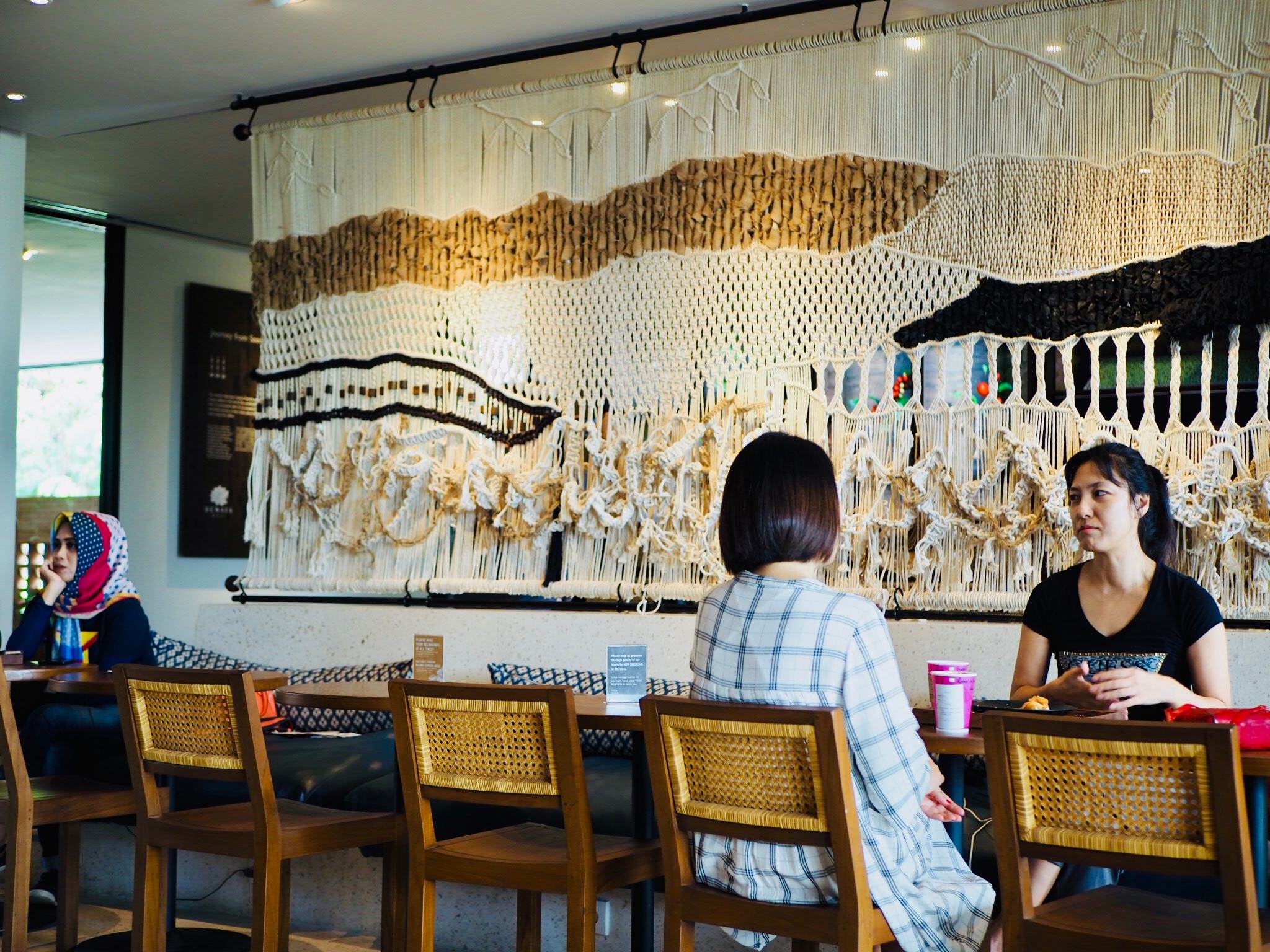Dewata's macrame wall hanging, dyed with natural coffee. Photo: Coconuts Bali
