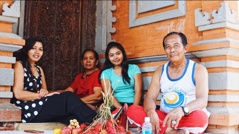 Kariani with her parents and younger sister at their family home in North Bali. Photo: Julianne Greco/Coconuts Bali