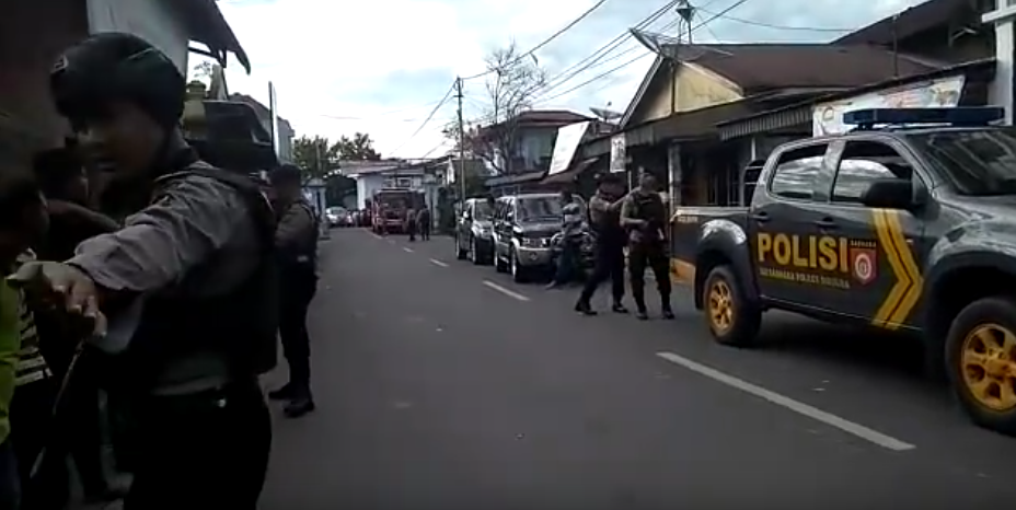 Police officers securing the scene of an explosion in the city of Sibolga, North Sumatra following the arrest of a suspected terrorist on Mar 12, 2019. Photo: Youtube