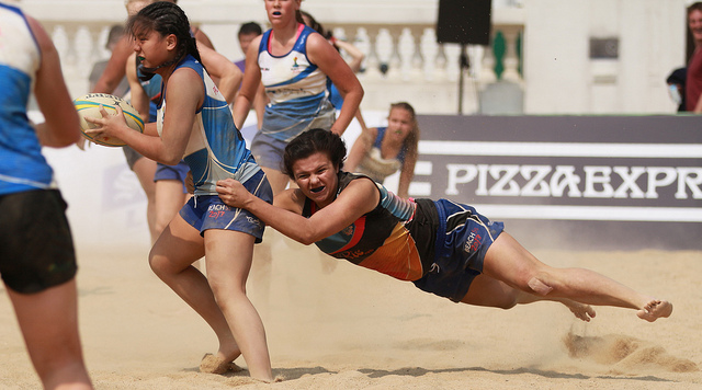 Women compete in the Hong Kong Beach 5s rugby competition in 2013. Photo via Charles Luk.