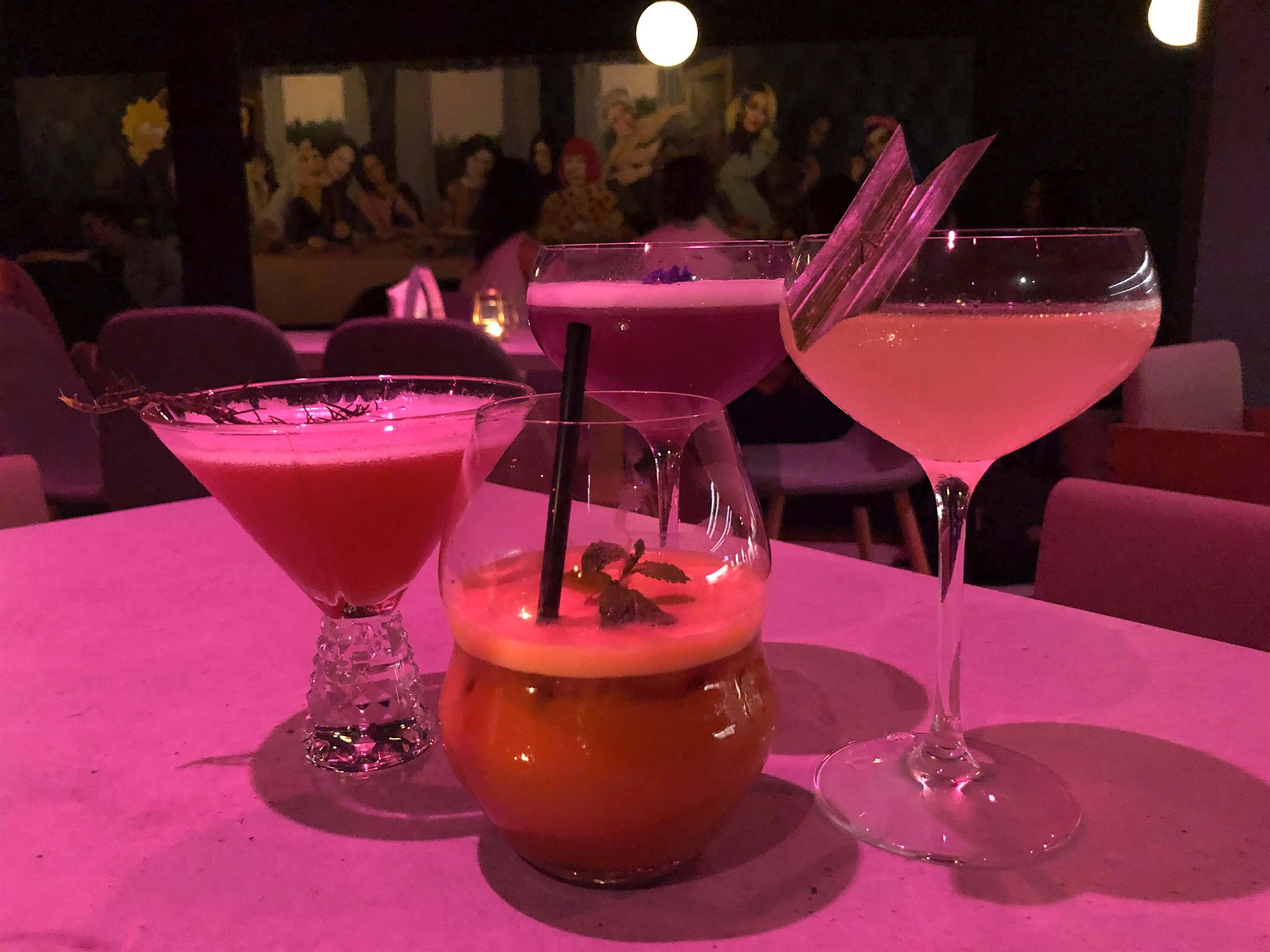 Some of Bar Gina’s signature craft cocktails, from left to right: Redhead Gypsy, Bangkok Dangerous (in the front), Lady Boss (in the back), and Between Moods. Photo: Nadia Vetta Hamid/Coconuts Media