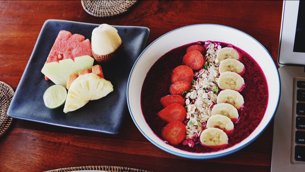 Fruit plate and dragonfruit smoothie bowl. Photo: Coconuts Bali