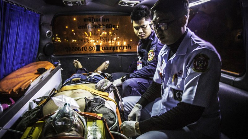 A road accident victim is rushed to the hospital in a Romsai Rescue Foundation ambulance in a 2015 file photo. Photo: Alexander Hotz / Coconuts Media

