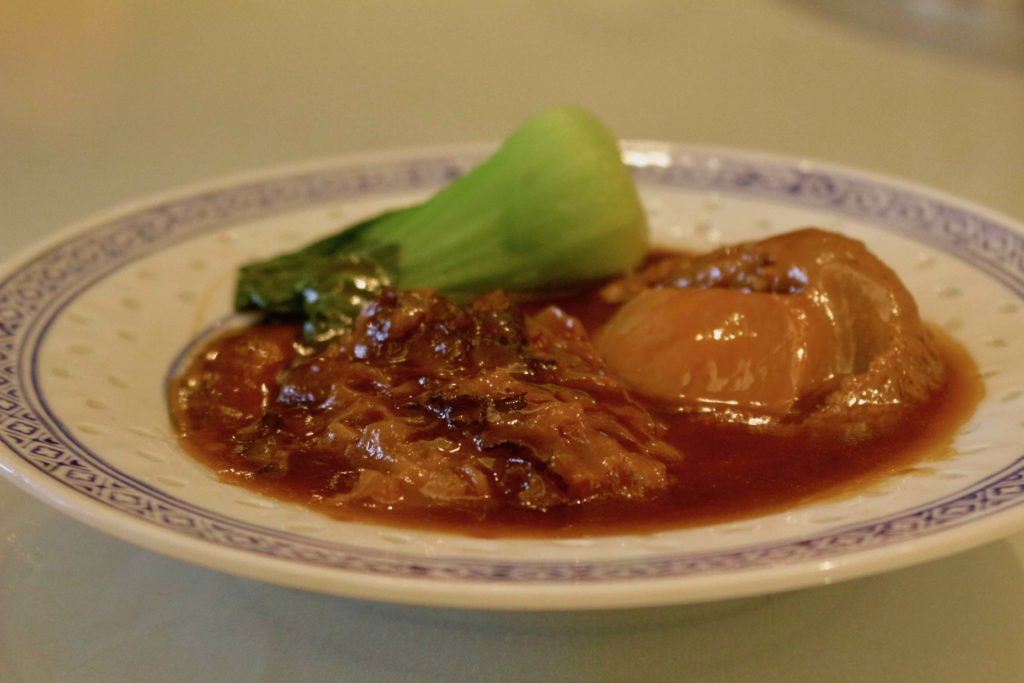 Man Hing's braised dried giant garoupa skin with thick sliced abalone in oyster sauce. Photo by Vicky Wong.