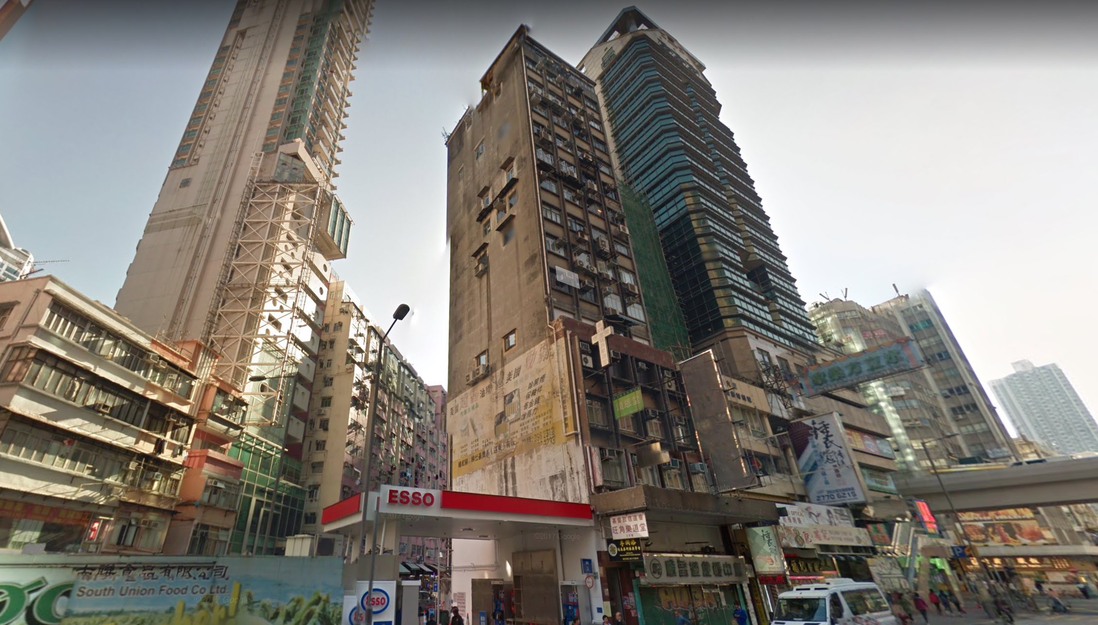 The Ngai Wong Commercial Building (center) on Mong Kok Road. Photo via Google Maps.