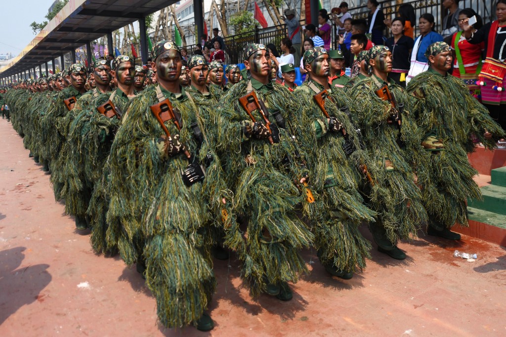 United Wa State Army (UWSA) special force snipers participate in a military parade, to commemorate 30 years of a ceasefire signed with the Myanmar military in the Wa State, in Panghsang on April 17, 2019. Ye Aung Thu / AFP