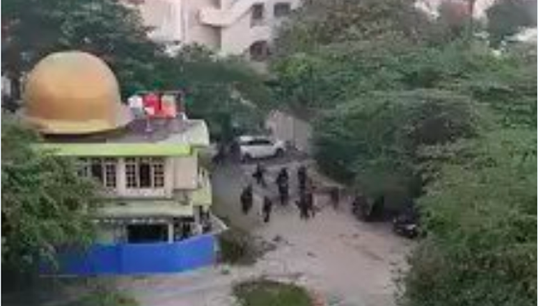 Screenshot from viral video showing Brimob officers beating a man in the Kampung Bali neighborhood of Central Jakarta on Thursday (23/5). 