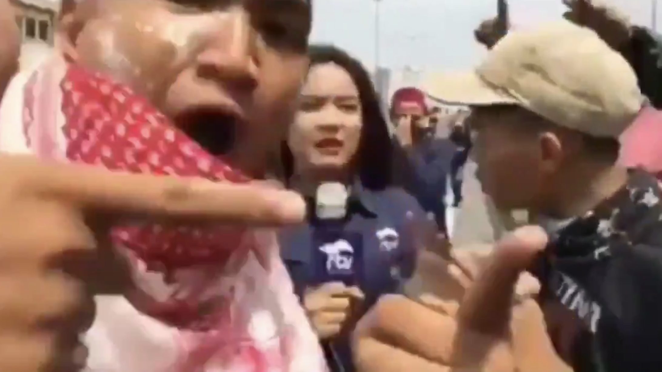 Screenshot of a video footage showing an RTV reporter being harassed by protesters during post-election riots. Photo: Fellya Hartono / Twitter