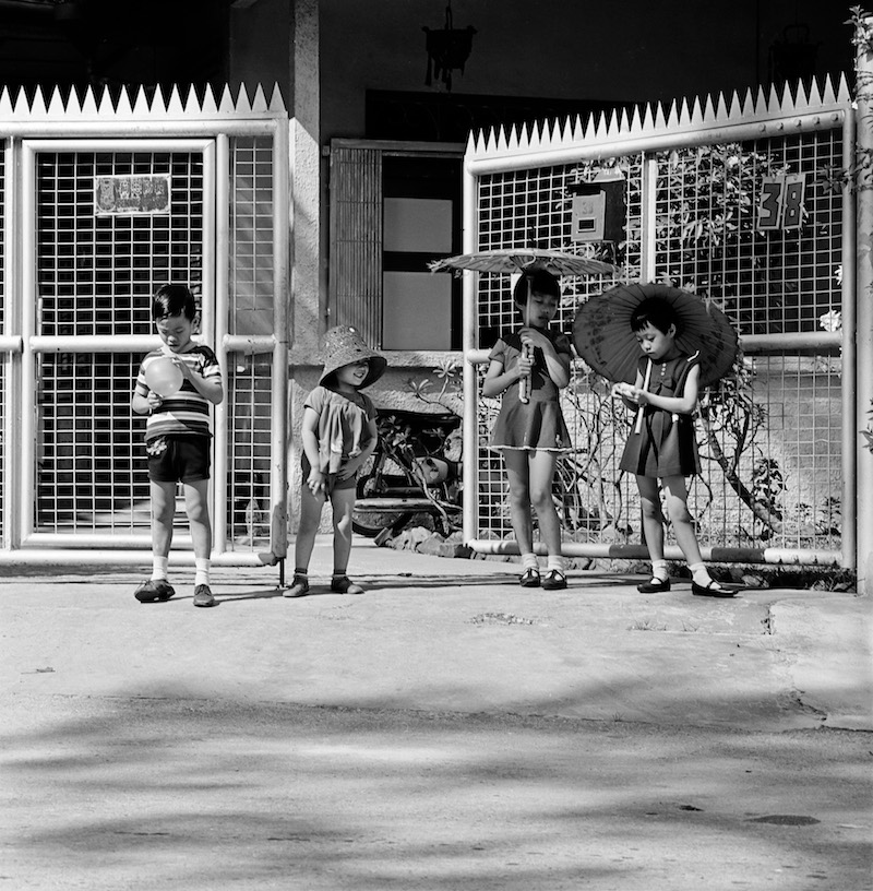 Mr Lim's children outside their home. Photo: Lim Kwong Ling
