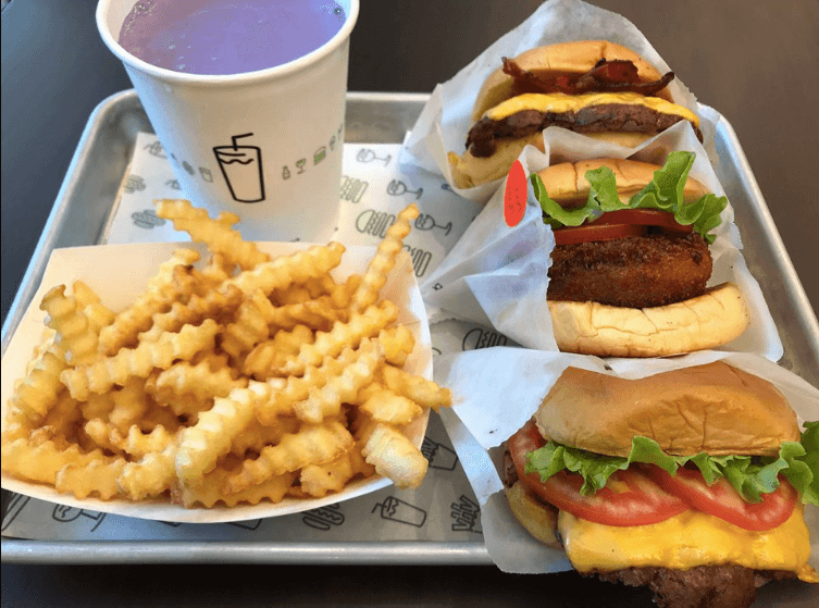 ShackBurger, SmokeShack, 'Shroom Burger, and the Manila-exclusive Ube Shake. Photo: Kaka Corral/Coconuts Media