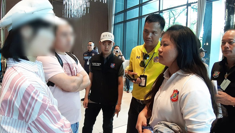 Tourist police on Thursday at the C Ekkamai condo in Bangkok. Photo: Tourist Police Bureau