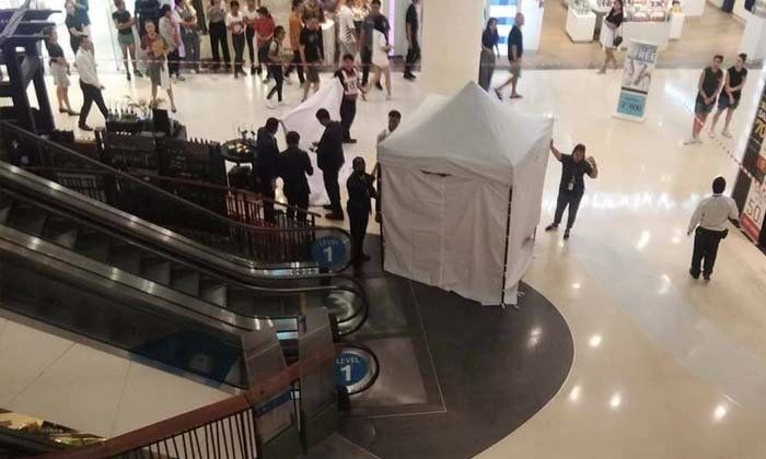 Where the foreign man, who plunged six floors to his death inside, landed in  Central Festival shopping mall yesterday afternoon. Photo: Sanook