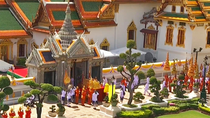 Royal items are paraded Friday morning to the throne hall where the king will be coronated at the Grand Palace in an image taken from live video. Image: ThaiPBS / YouTube