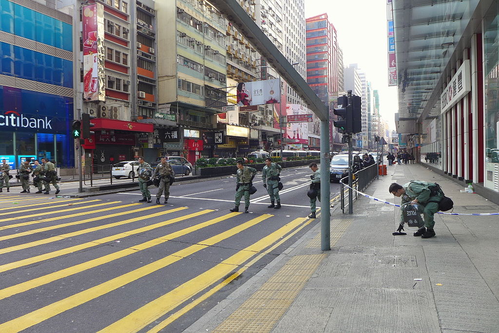 Police on standby on Nathan Road in Kowloon following the so-called “Fishball Revolution” in 2016. Photo via WikiCommons/Wpcpey