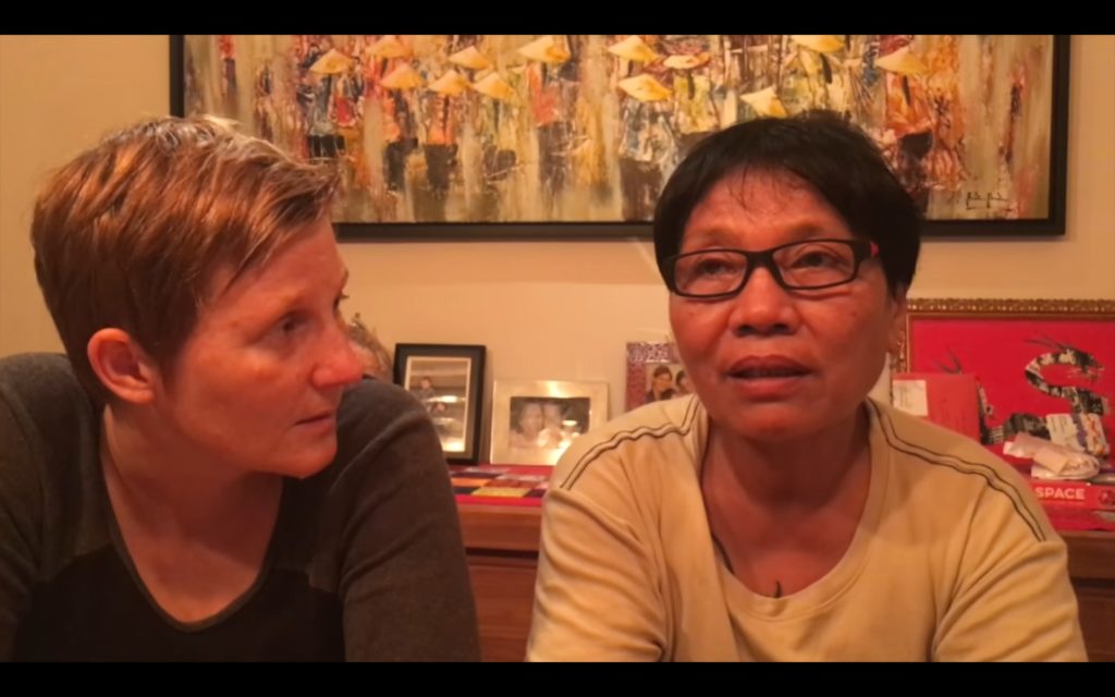 Marrz Balaoro (right) speaks in a video about a charity for LGBT migrant workers in 2017. Screengrab via YouTube.