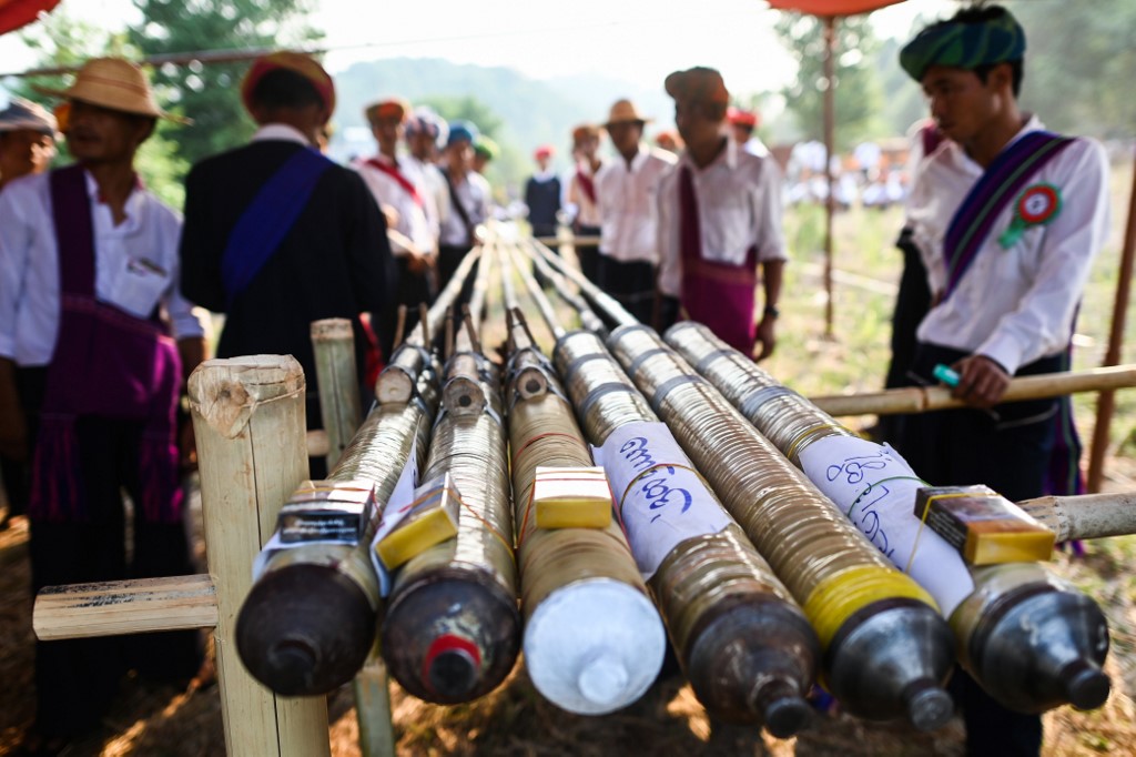 In this picture taken on April 29, 2019, Pa’O ethnic people prepare homemade rockets for launching during a festival in Nantar, Shan state. (Photo by Ye Aung Thu / AFP)