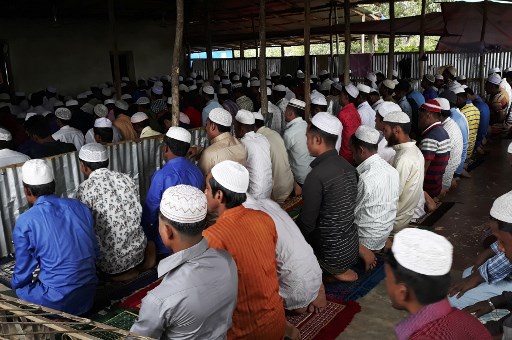Young Rohingya refugees offer Eid Al-Fitr prayer in a June 2019 file photo at a refugee camp near Cox’s Bazar in Bangladesh. Photo: Suzauddin Rubel / AFP