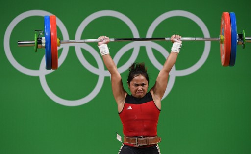 Philippines’ Hidilyn Diaz competes during the women’s 53kg weightlifting event at the Rio 2016 Olympic games in Rio de Janeiro on August 7, 2016. (Photo: Go Chai Hin/AFP)