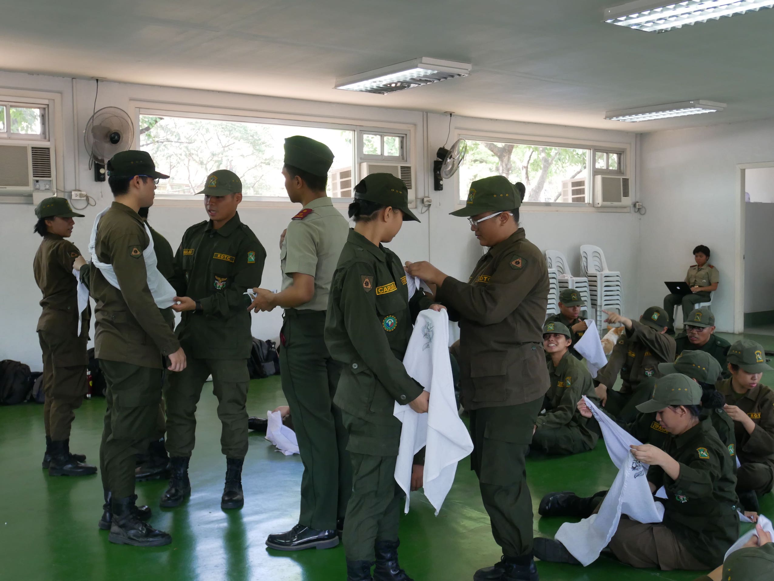 Students are taught first aid in an ROTC class at the University of the Philippines Diliman. Photo: Rachel Malaguit