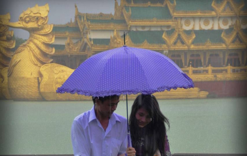 Via Pinterest by Fernando Lizarraga. Couple in the rain. Yangon, Myanmar