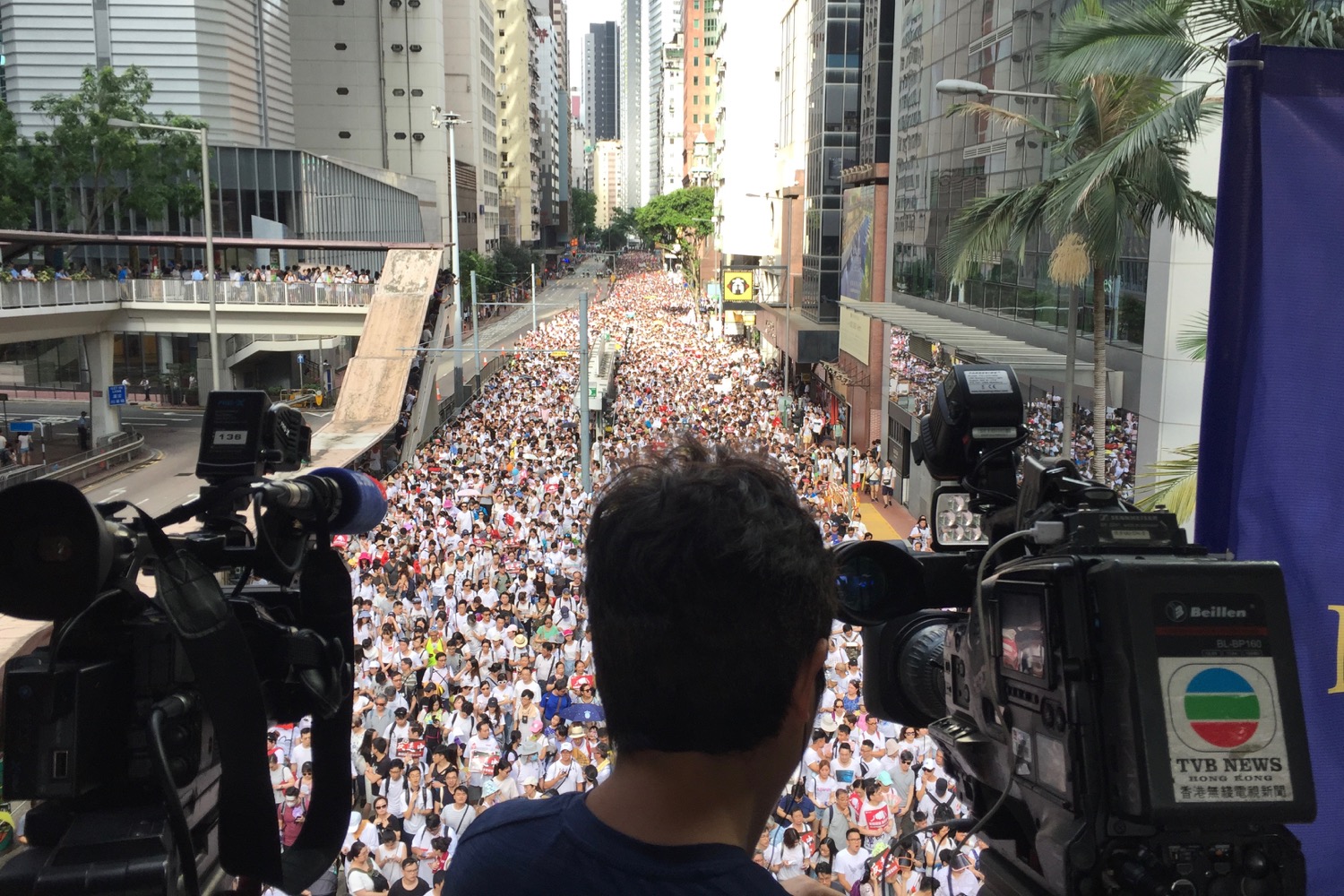 Hundreds of thousands of protesters march through Hong Kong in June to protest a controversial extradition bill. Photo by Stuart White.