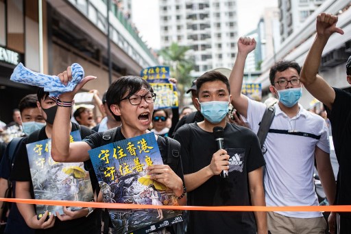 Protesters attend a rally against a controversial extradition law proposal in Sha Tin district of Hong Kong on July 14, 2019. (Photo by Philip FONG / AFP)