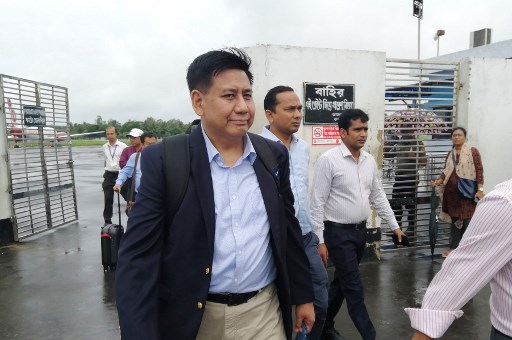 Members of the Myanmar delegation team arrive at the airport in Cox’s Bazar in southern Bangladesh on July 27, 2019, ahead of expected meetings with Rohingya leaders to inform them of measures they have taken for their return to Rakhine. – Security at Rohingya refugee camps in Bangladesh was tightened for the visit of a high-level Myanmar delegation this weekend for repatriation talks, officials said. (Photo by SUZAUDDIN RUBEL / AFP)