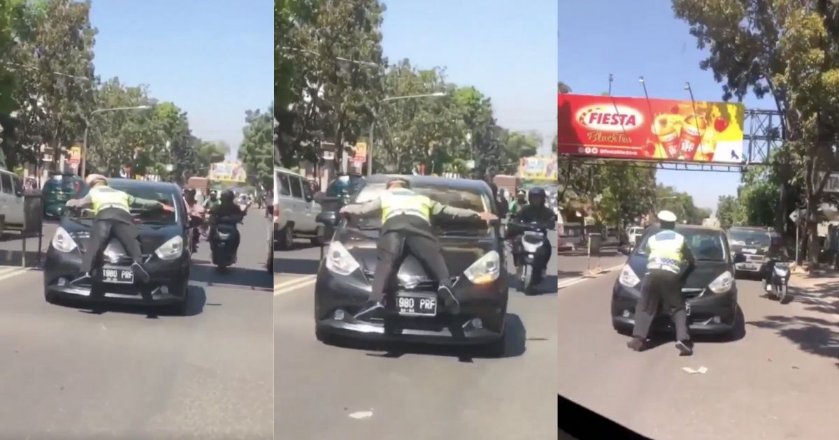 Recently, a video has gone viral showing a police officer lying face down and being carried on the hood of a car as it travelled quite a distance. Screenshot from Twitter/@altefalken