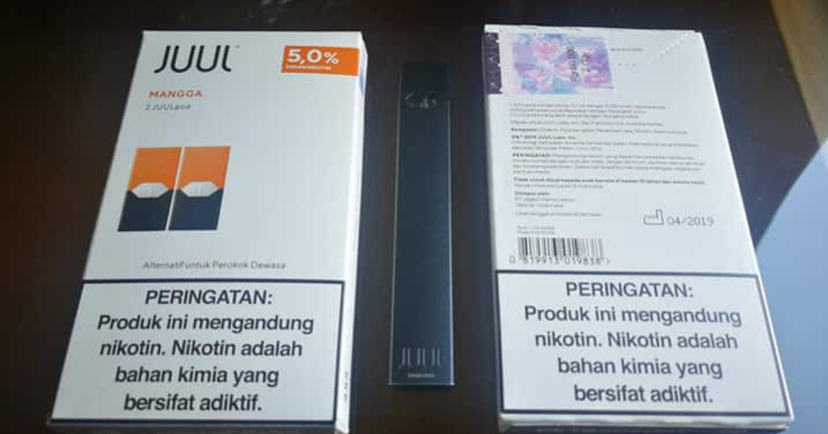 Official Juul pod packs and a Juul device sold in Indonesia.