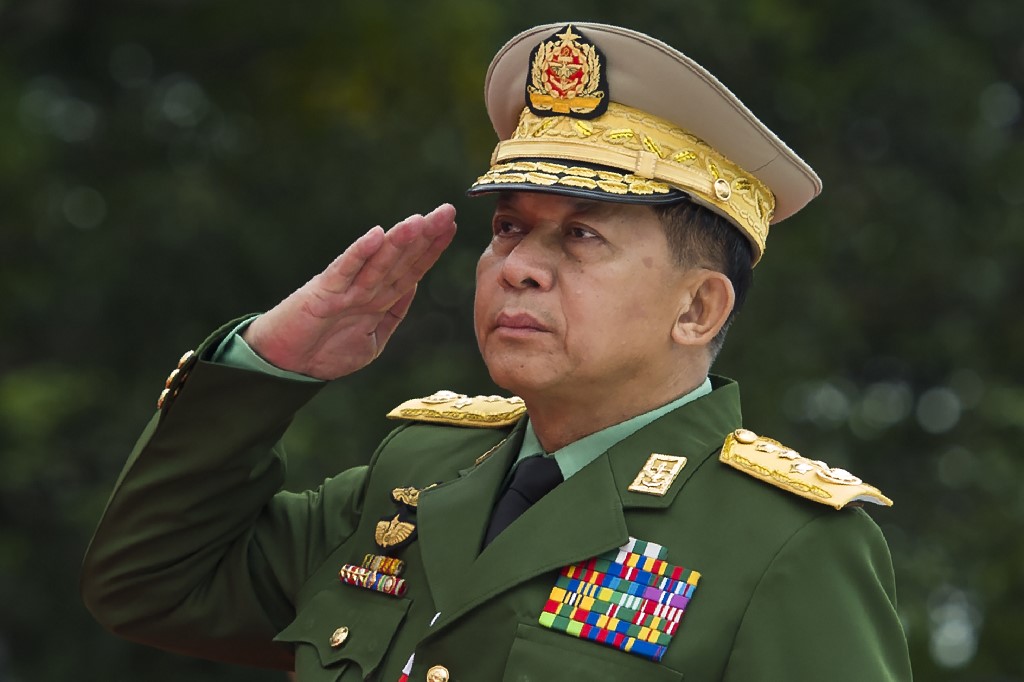 (FILES) This file photo taken on July 19, 2018, shows Myanmar’s Chief Senior General Min Aung Hlaing, commander-in-chief of the Myanmar armed forces, saluting to pay his respects to Myanmar independence hero General Aung San and eight others assassinated in 1947, during a ceremony to mark the 71th anniversary of Martyrs’ Day in Yangon. Photo by Ye Aung Thu/AFP