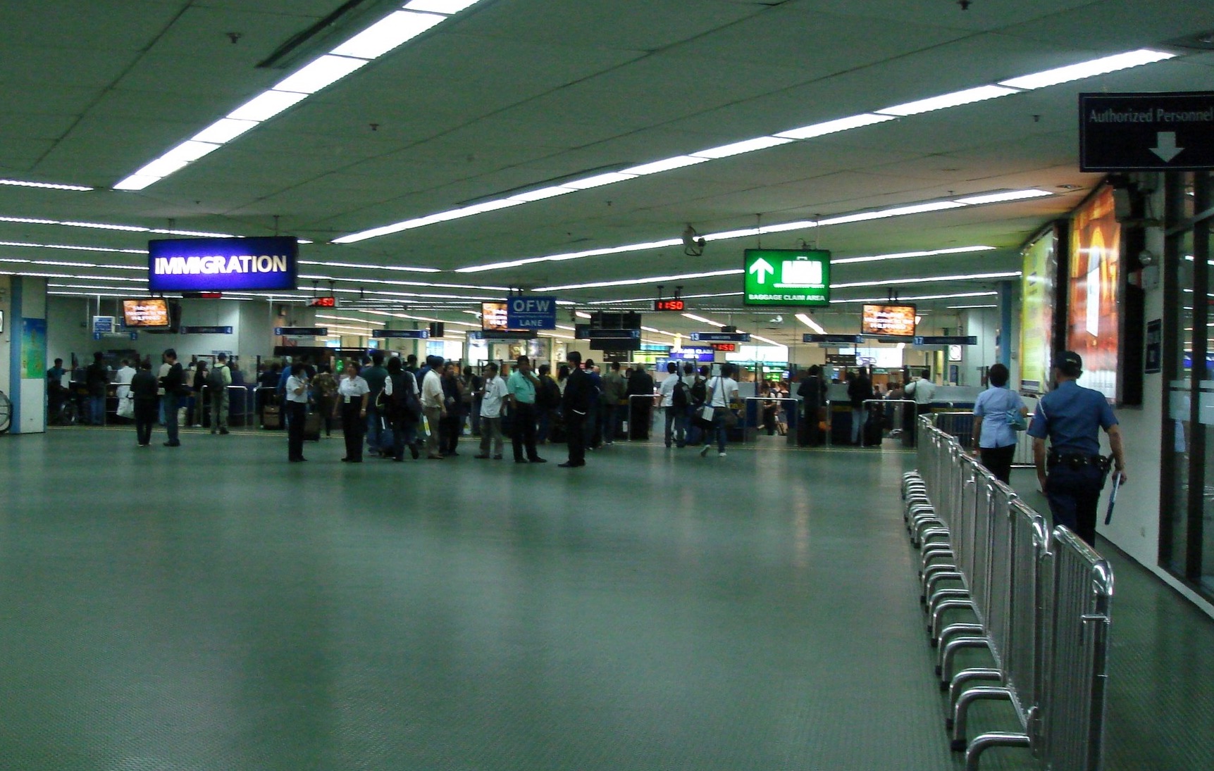 The immigration area of Ninoy Aquino International Airport in Manila. Photo via Flickr/Jill Shih.
