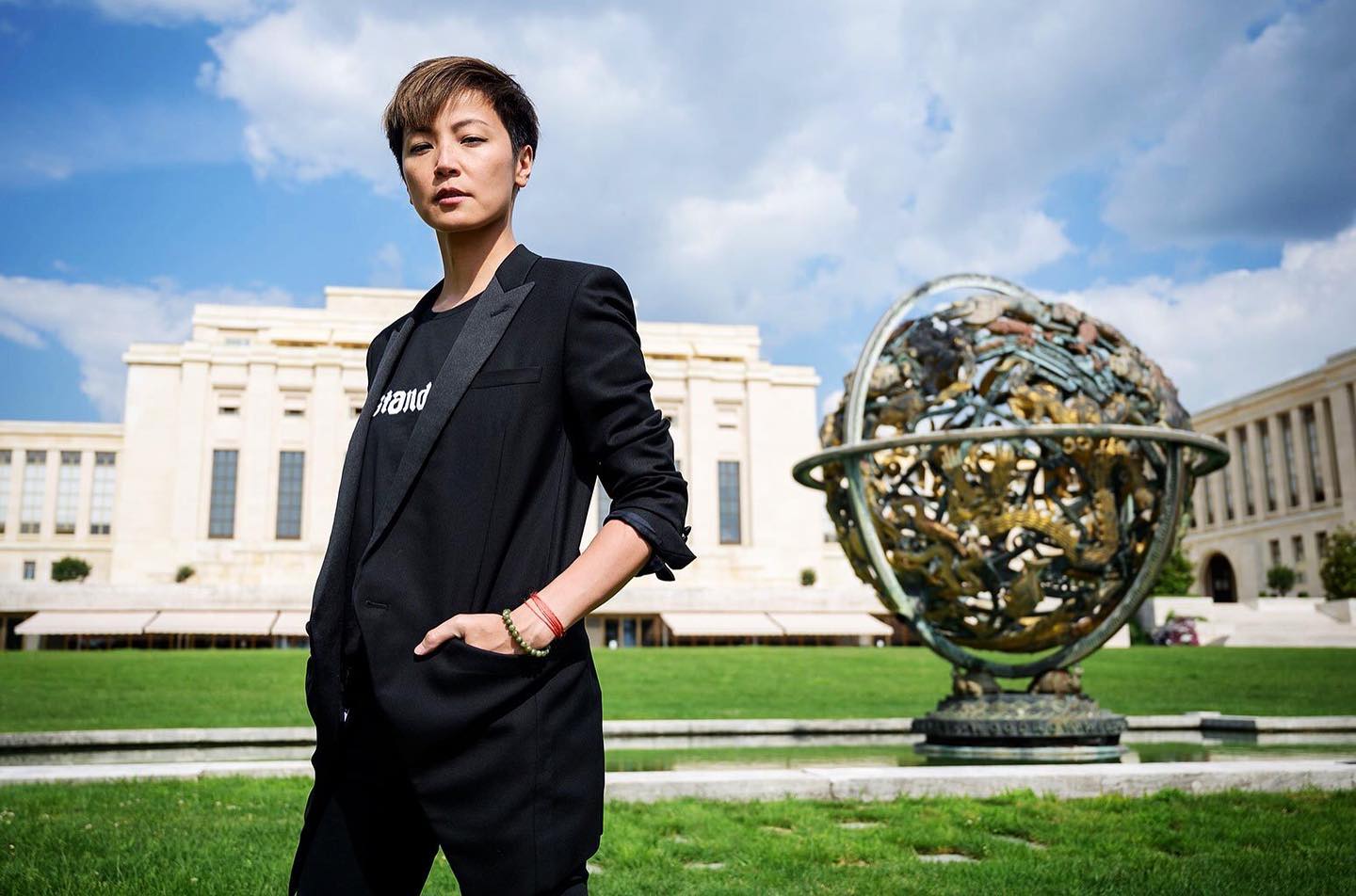 Cantopop star Denise Ho stands in front of the UN rights council headquarters in Geneva, where she gave a speech on July 9. Photo via Facebook.