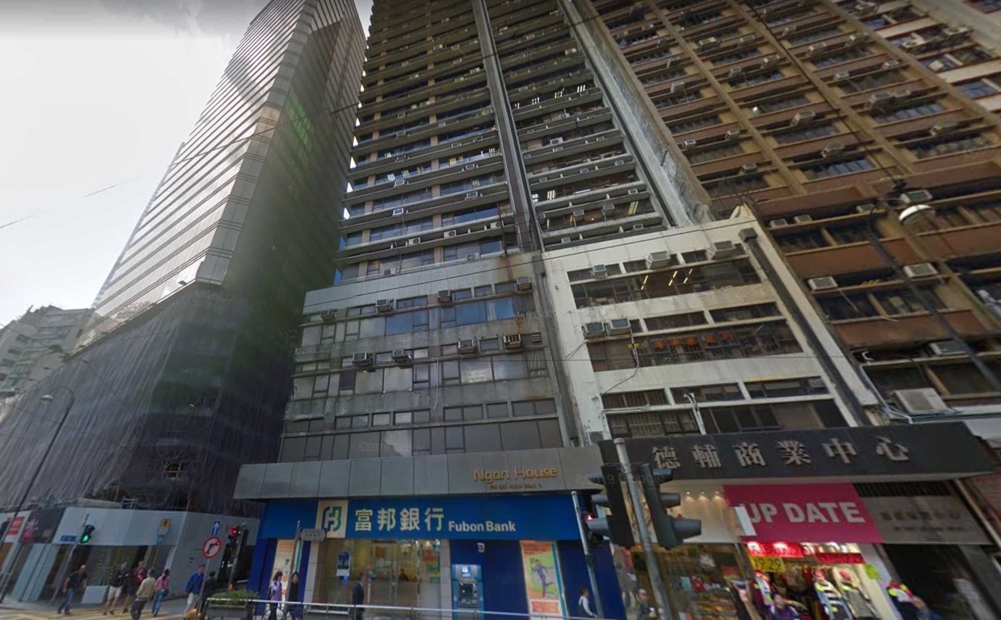 An exterior shot of Ngan House, the building that housed Overseas First Credit, where some 1,400 Philippines passports were seized after they were used as collateral for loans. <i></noscript>Photo: Google Maps.</i>