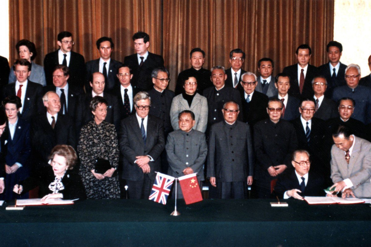 Margaret Thatcher (left) and Zhao Ziyang (right) sign the Sino-British Joint Declaration in 1984. Photo via Xinhua.