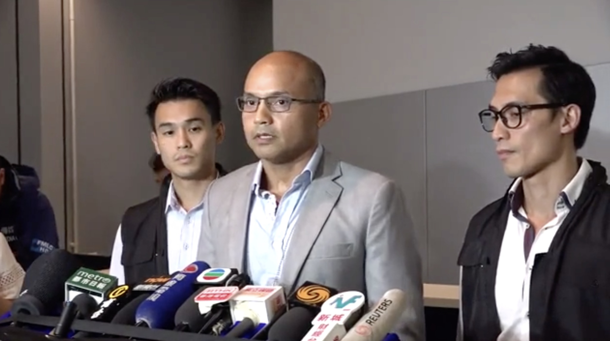 Superintendent Swalikh Mohammed of the Cyber Security and Technology Crime Bureau telling reporters that eight people have been arrested for doxxing police officers believed to be working on the frontlines during the extradition bill protests. Screengrab via Apple Daily video.