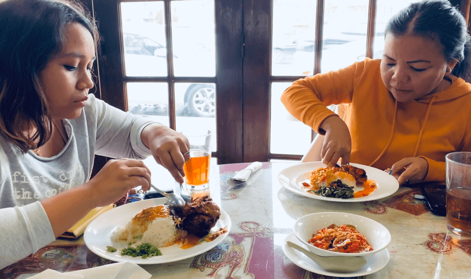our globe-trotting Acehnese friend Rifa (right) visited with us from Jakarta via Los Angeles: “This is the place for rendang! They do it in the most authentic way I have eaten in the United States.” Photo: Juliette Yu-Ming Lizeray.