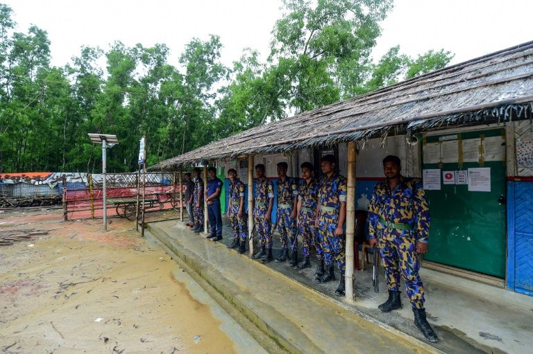 Security personnel stand guard at Jadimura refugee camp in Teknaf on August 24, 2019, following a gunfight between Bangladesh police and Rohingya refugees. Bangladesh police shot dead two Rohingya refugees in a gunfight on August 24 after they were accused of killing a ruling party official in a refugee camp, police said.
Munir UZ ZAMAN / AFP