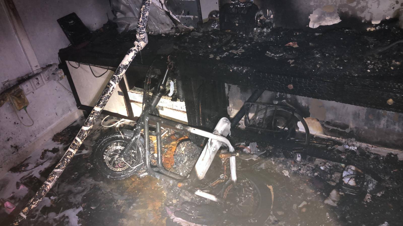 An e-scooter found in the aftermath of a fire at Sembawang flat. (Photo: SCDF/fb)