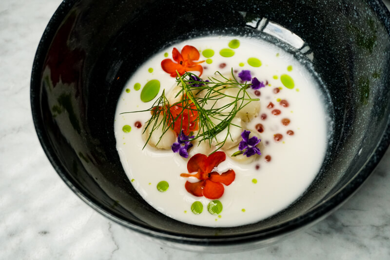 Poached scallop, coconut broth and salmon roe at San. <i></noscript>Photo: Coconuts Media</i>