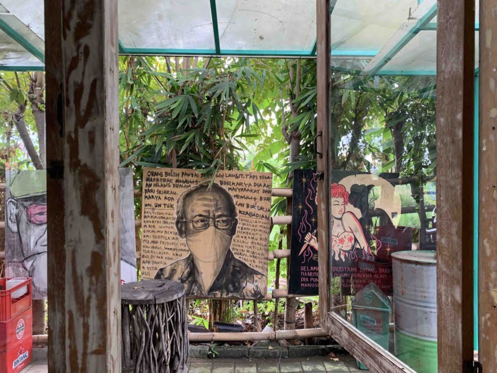 A painting of Pramoedya Ananta Toer at Taman Baca Kesiman. Photo: Coconuts Media