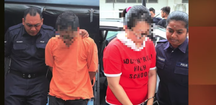 The suspect, along with his wife, via Harian Metero TV