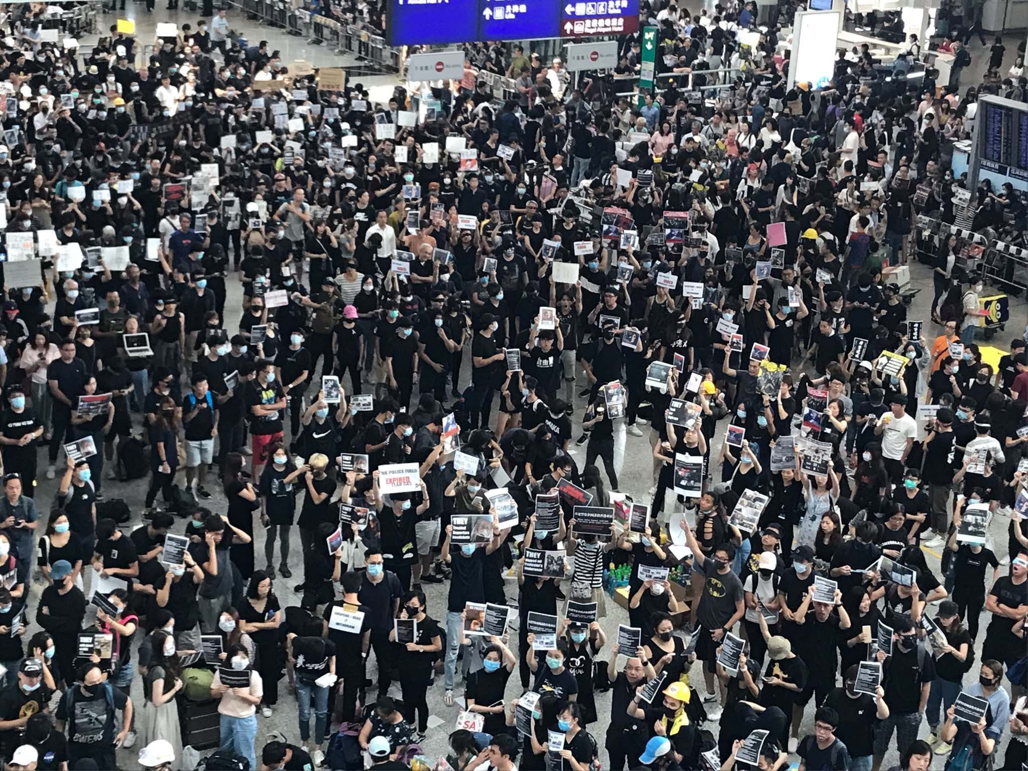 A crowd of protesters at Hong Kong International Airport on Monday. Photo by Cheryl Ho.
