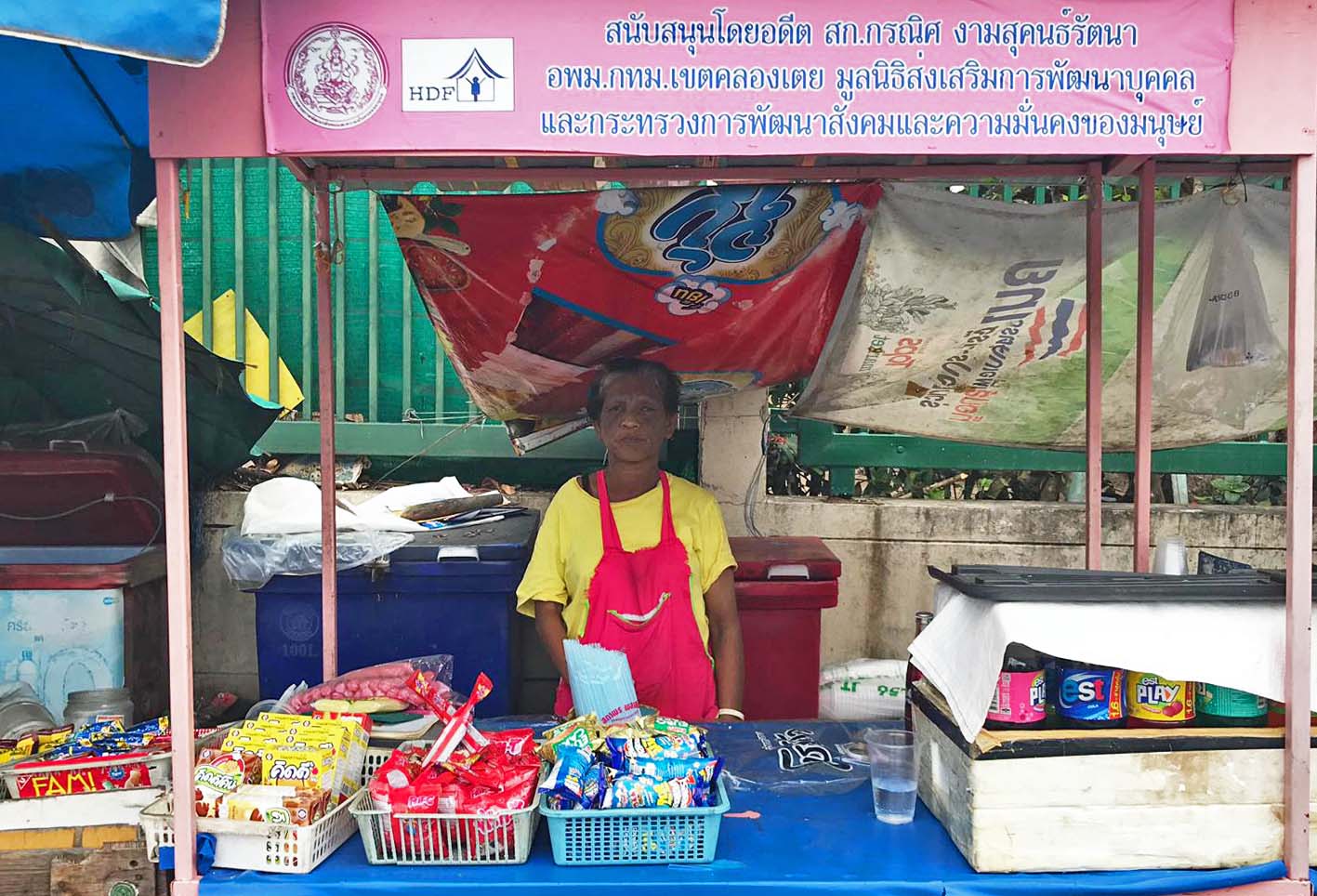 Ratchani Cheausuwan, 55, sells snacks near the Khlong Toei community where she was born. She has no idea what she will do once she is evicted along with the children she cares for. Photo: Coconuts