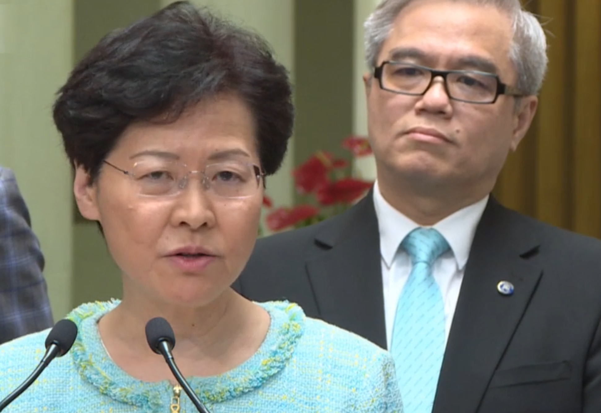 Hong Kong Chief Executive Carrie Lam speaks to the press today. Screengrab via Facebook.