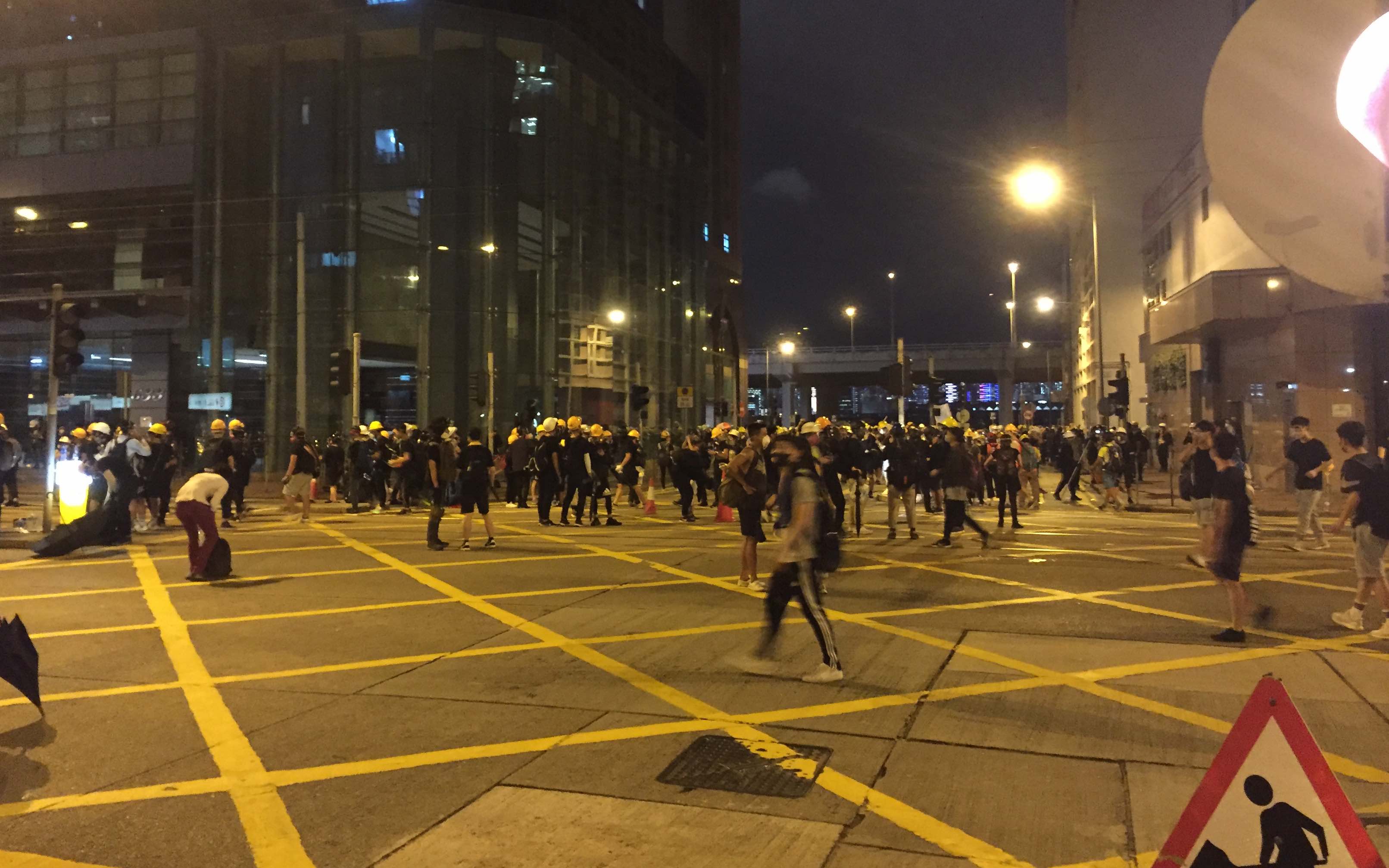Protesters gather in North Point, where police deployed tear just before 9pm. Photo by Stuart White.
